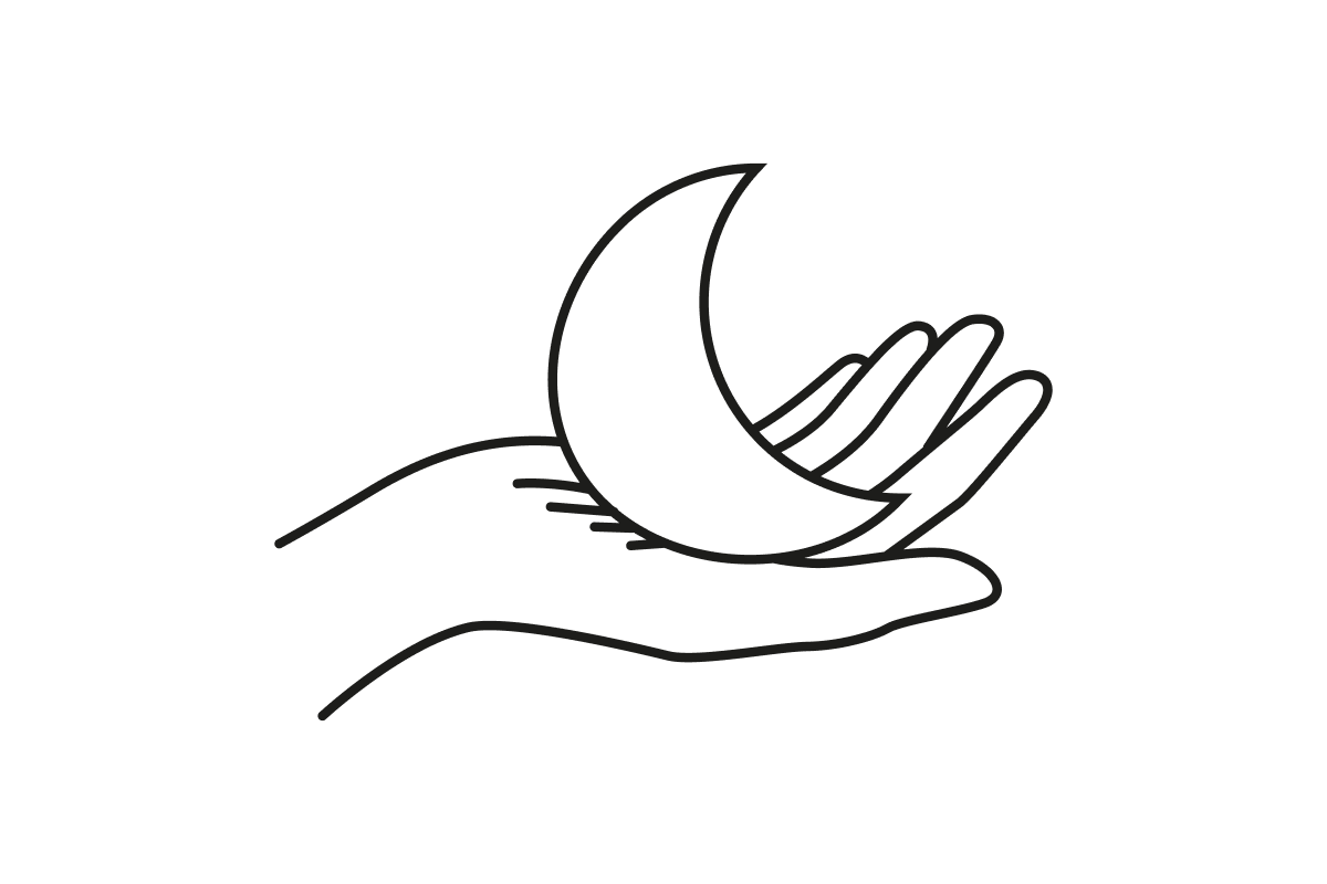 Hand holding a crescent moon